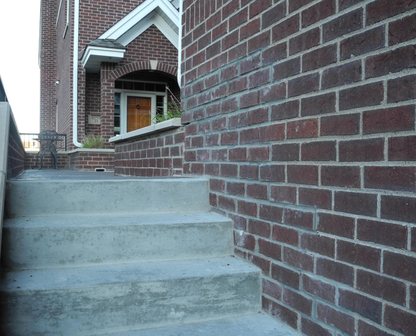 Front View Of Front Door And Concrete Stairs in Woodbury, Minnesota