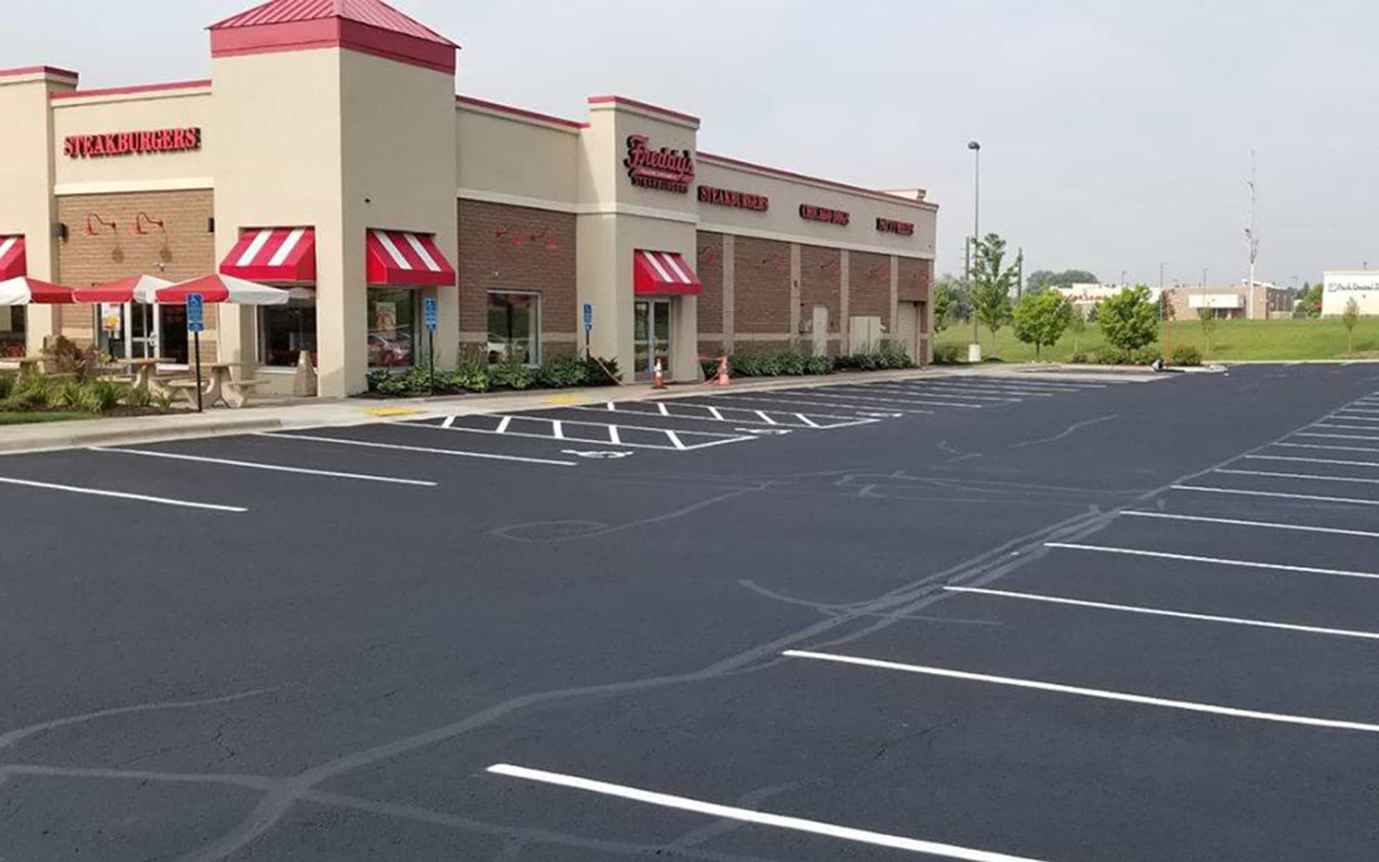 Side View Of Freddys seal coated parking lot in Maple Grove, Minnesota