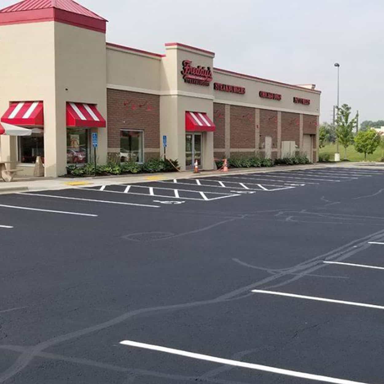 Square Side View Of Freddys And Parking Lot in Eden Prairie, Minnesota
